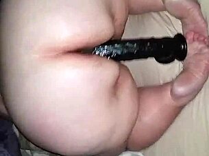Is this BBW riding a big dildo?