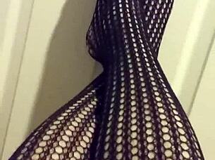 Fetish Model in Stockings Poses for Detailed Close-Up Shots