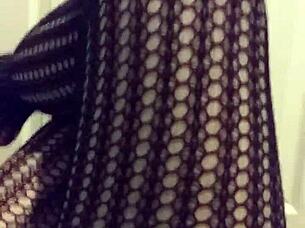 Fetish Model in Stockings Poses for Detailed Close-Up Shots