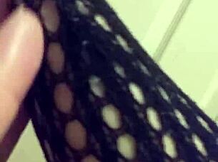 Fetish Model in Stockings Poses for Detailed Close-Up Shots