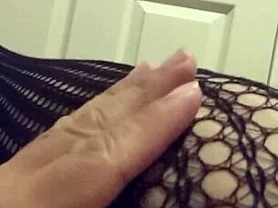 Fetish Model in Stockings Poses for Detailed Close-Up Shots