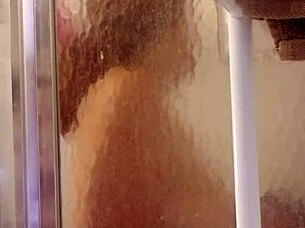 shy milf showers and shaves her big ass and tits