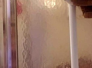 shy milf showers and shaves her big ass and tits