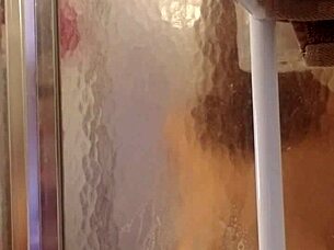 shy milf showers and shaves her big ass and tits