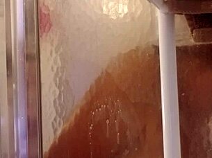 shy milf showers and shaves her big ass and tits