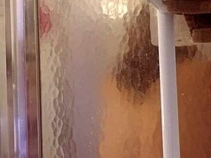 shy milf showers and shaves her big ass and tits