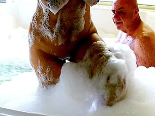 In jacuzzi, black woman with big tits enjoys blowjob and sex