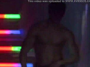 Watch handsome Brazilian stripper rip clothes in wild striptease!