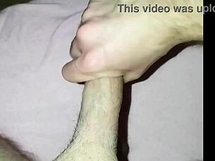 young guy masturbating his cock