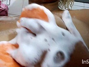 Amateur uses dildo in the shower for massage