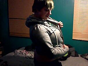 Busty slut with pierced nipples strips clothes ripped on webcam