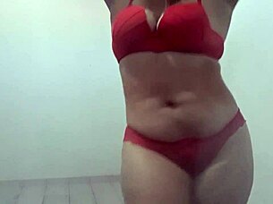 hot latina mature woman dances sensually in the club