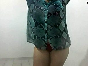 hot latina mature woman dances sensually in the club