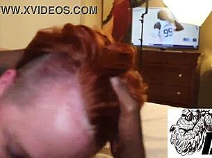 Redhead MILF in interracial encounter with large partner