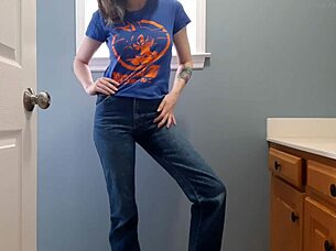 Wetting tight denim jeans in bathroom with panties