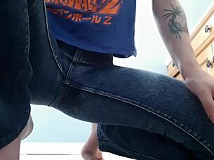 Wetting tight denim jeans in bathroom with panties