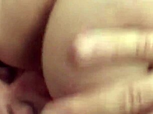 Guy cums on brunette's ass, then makes the other eat it