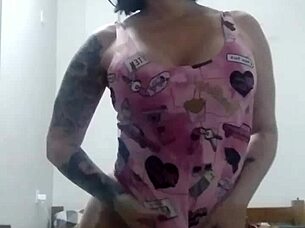 the mature woman dances showing her big ass