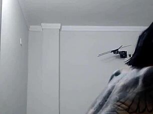 the mature woman dances showing her big ass