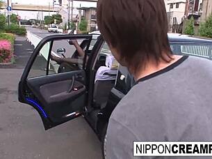 hot japanese babe fucks him in the car for creampie