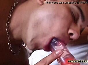 girl bends guy over for strapon fuck