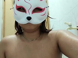 Young filipina plays with her big natural tits!