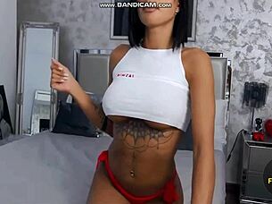 Cherrie Doll shows off her big tits and tanned legs!