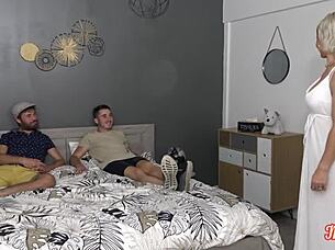 Kim the French cougar handles two hard cocks expertly!