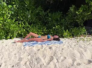 crazy girl gets pissed on at public beach and squirts shocked