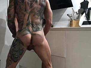 gay blowjob in the kitchen
