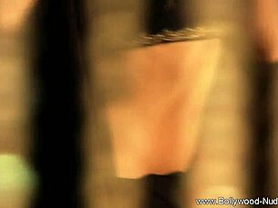 dancing queen from india teases with striptease and undressing on stage.