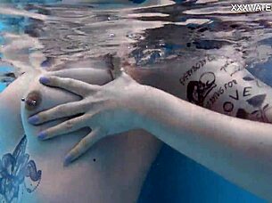 nude swimming in the pool with tattooed babe mimi cica