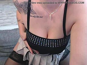 European girl in miniskirt and sexy dessous striptease