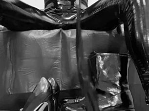 look at these fetish boots, high heels, latex gloves, and shiny leggings on that ass.