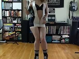 Blonde milf strips black and white skirt, revealing big tits and ass