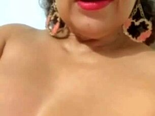 Horny milf masturbates while showing off her big tits and ass