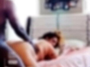 Frankie performs a hot striptease in stockings and heels.