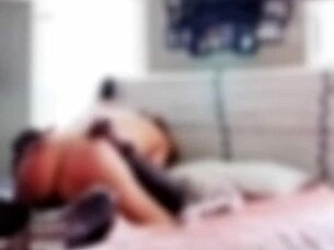 Frankie performs a hot striptease in stockings and heels.