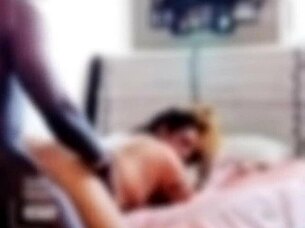 Frankie performs a hot striptease in stockings and heels.