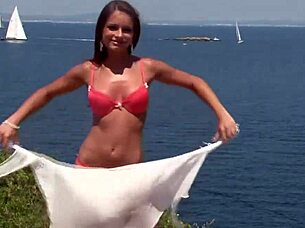 I watched chick in bikini strip by cliff