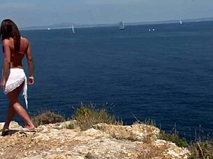 I watched chick in bikini strip by cliff