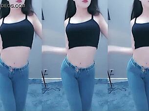 cute chinese girl dances with seductive hip shakes in steamy video