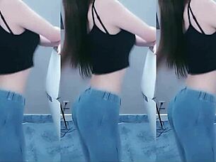 cute chinese girl dances with seductive hip shakes in steamy video