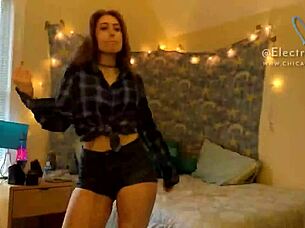 Blonde milf strips and masturbates on bed