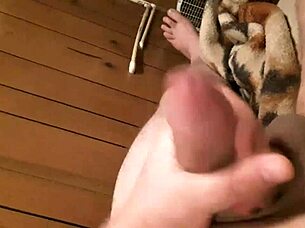 shaved hairless cock stroked and played with intensely