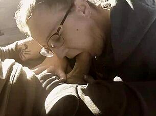 Nerd sucks big cock in parking lot.