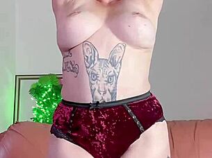 She fingers her hairy pussy.