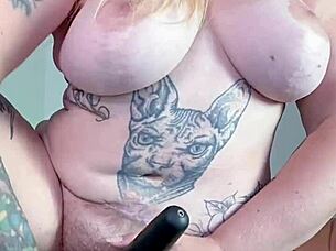 She fingers her hairy pussy.