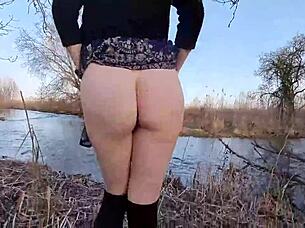 Shy Redhead Undresses Outdoors First Time