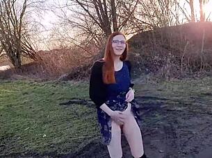 Shy Redhead Undresses Outdoors First Time